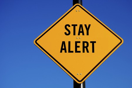 stay alert road sign