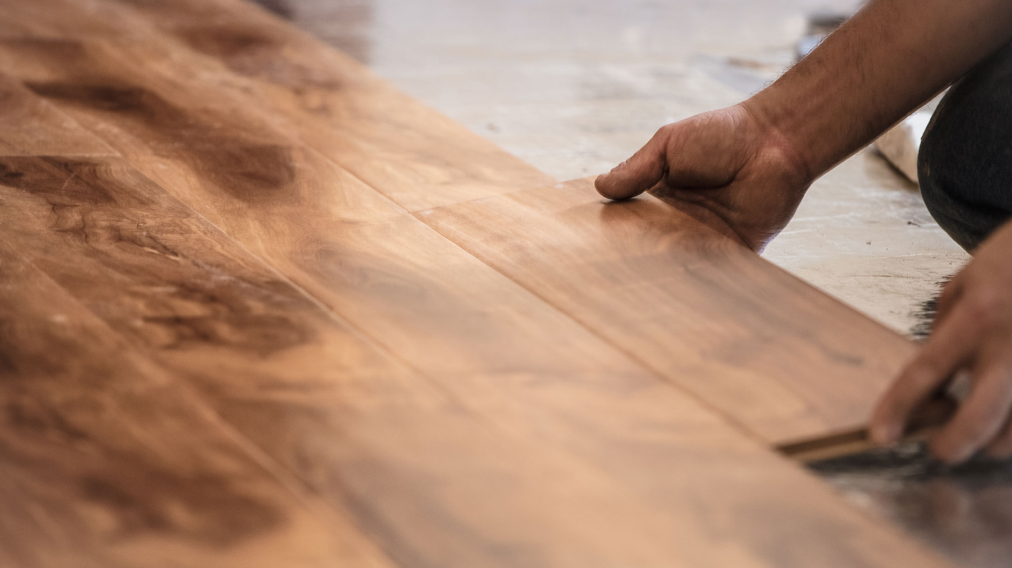 laying down wood floors