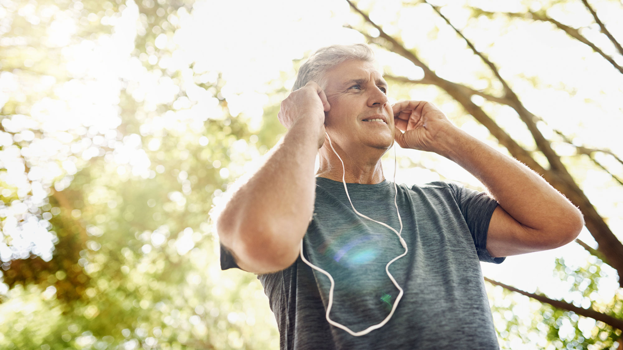 Man putting in headphones