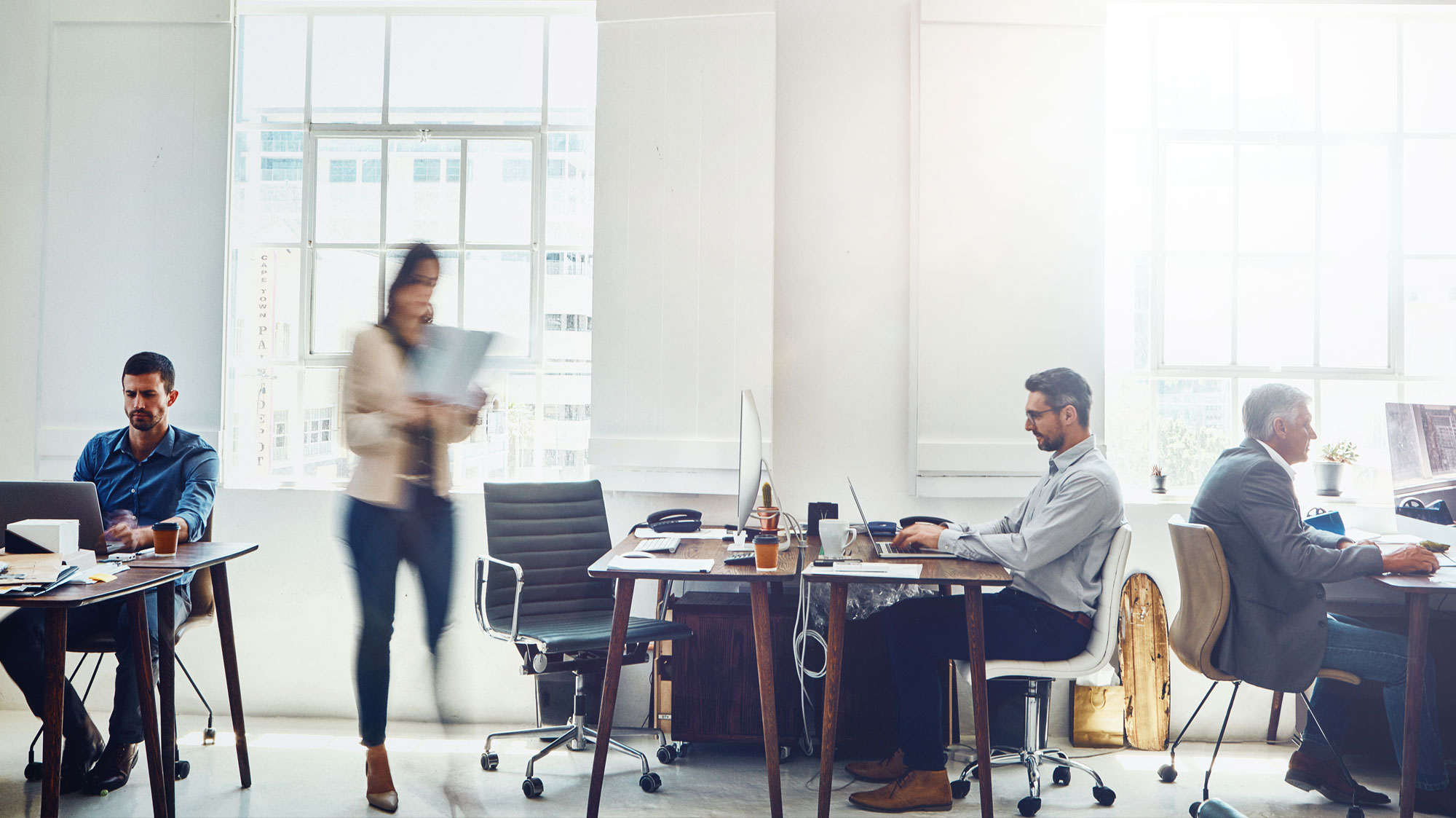 man and woman in office