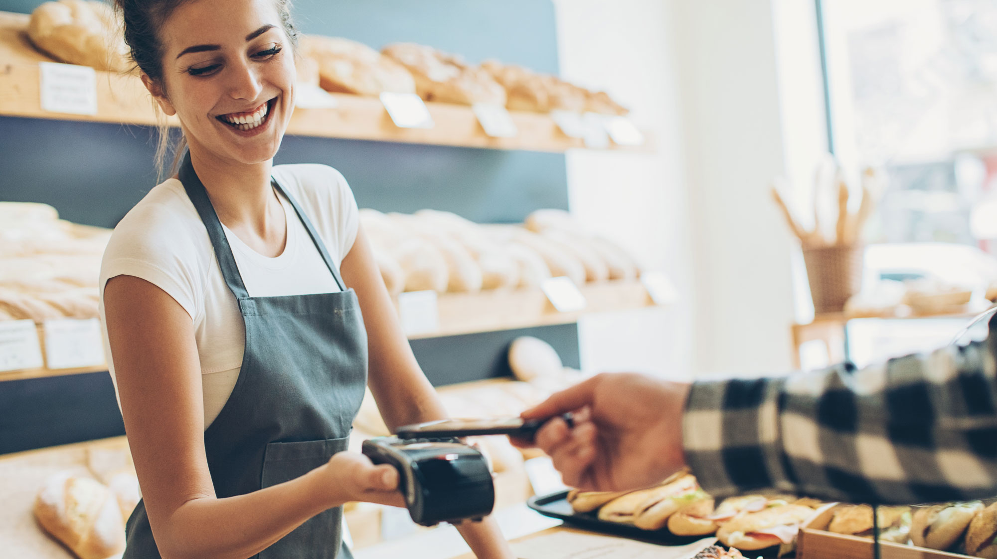 person paying with phone