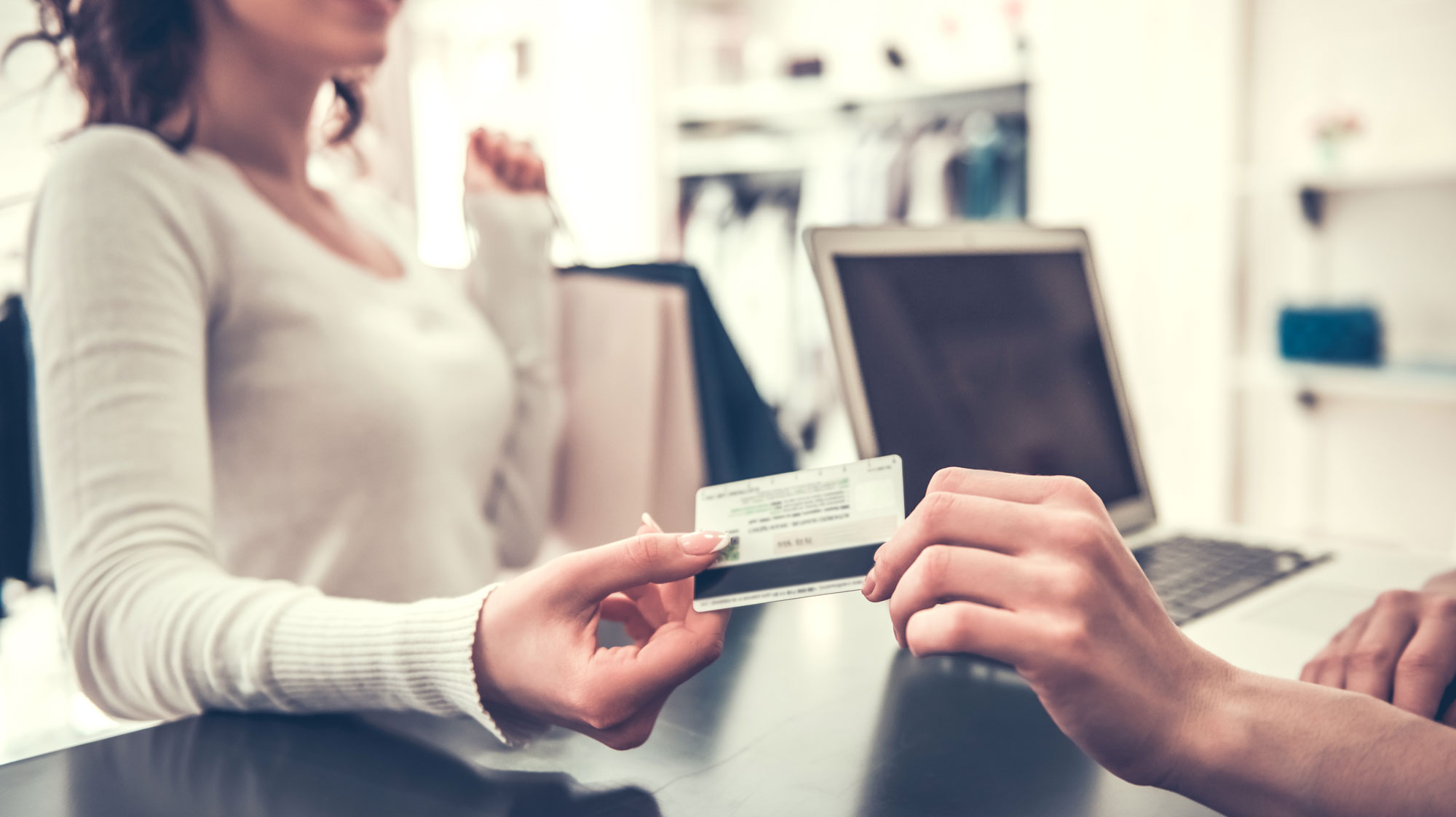 Woman using credit card